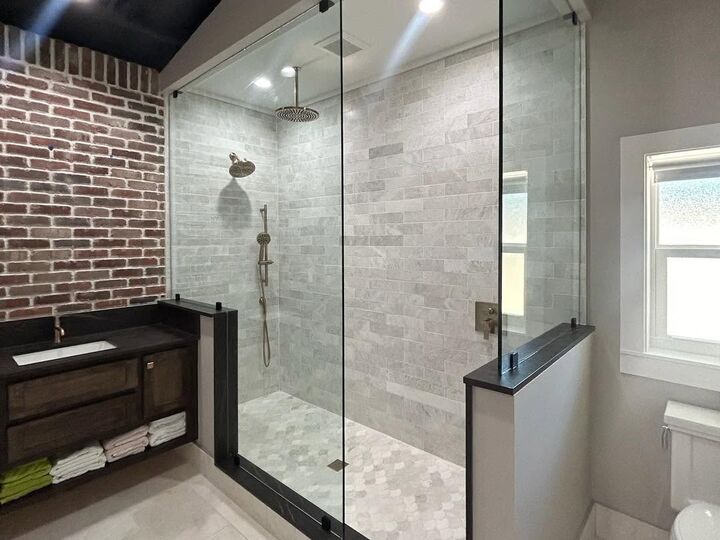 Frameless corner shower enclosure installed by Deep South Glass